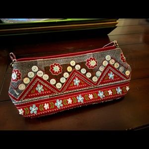 Patriotic boutique bag with faded paisley lining.